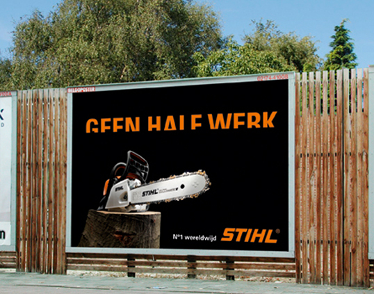 Importance of strong copy for adverts: "No half work" (with characters sawn in half))