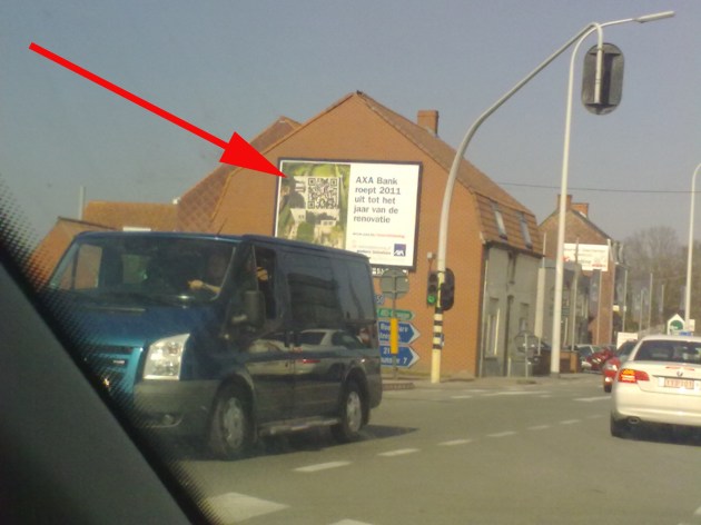 Axa puts a qr code on large format print ad on a busy road